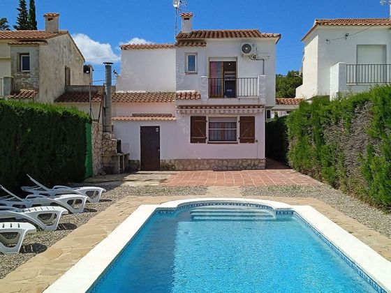 Foto 1 de Casa adossada en venda a calle Les Tres Cales de 4 habitacions amb terrassa i piscina
