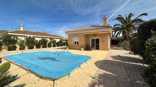 Foto 1 de Chalet en venta en El Fondo de les Neus-El Hondon de las Nieves de 2 habitaciones con terraza y piscina