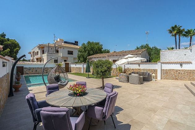 Foto 1 de Casa adossada en venda a  El Acequión - Los Naúfragos de 4 habitacions amb terrassa i piscina