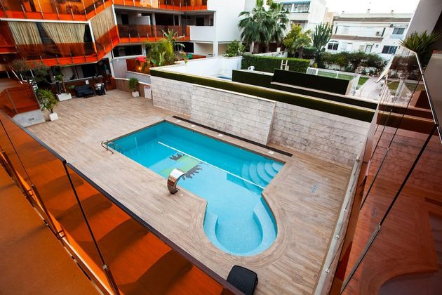 Foto 1 de Venta de piso en Playa del Cura de 2 habitaciones con piscina y jardín