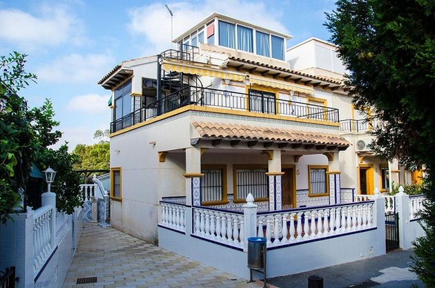 Foto 2 de Casa adosada en venta en Playa Flamenca - Punta Prima de 2 habitaciones con terraza y piscina