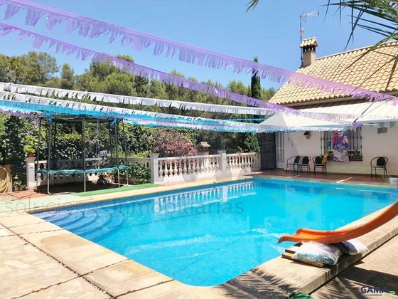 Foto 1 de Chalet en venta en Carcaixent de 4 habitaciones con terraza y piscina