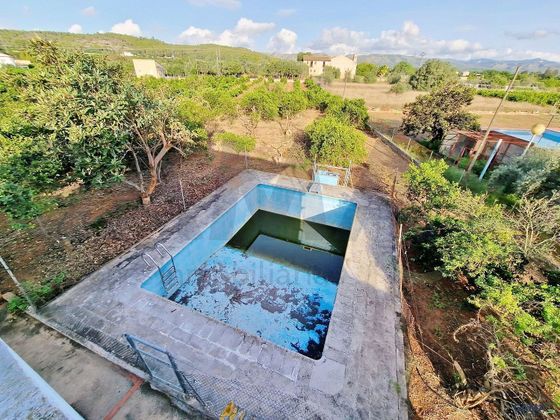 Foto 1 de Venta de chalet en Pobla Llarga (la) de 3 habitaciones con terraza y piscina
