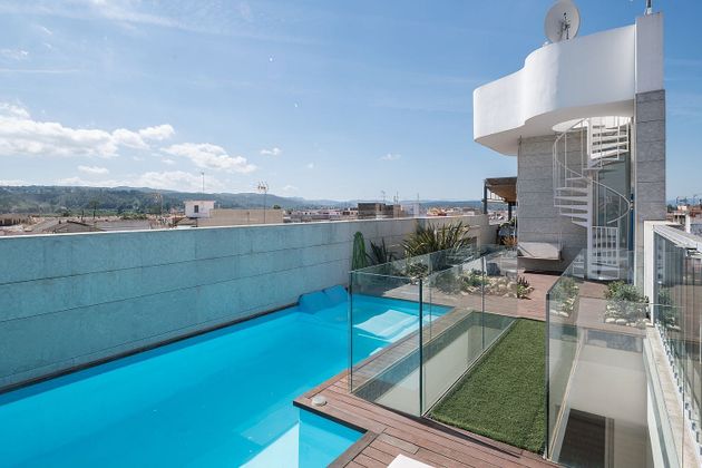 Foto 1 de Casa adossada en venda a Carcaixent de 5 habitacions amb terrassa i piscina