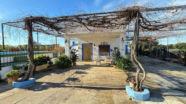 Foto 1 de Casa rural en venda a Rafelguaraf de 4 habitacions amb piscina i garatge
