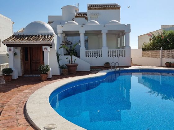 Foto 1 de Venta de chalet en El Perellonet de 5 habitaciones con terraza y piscina