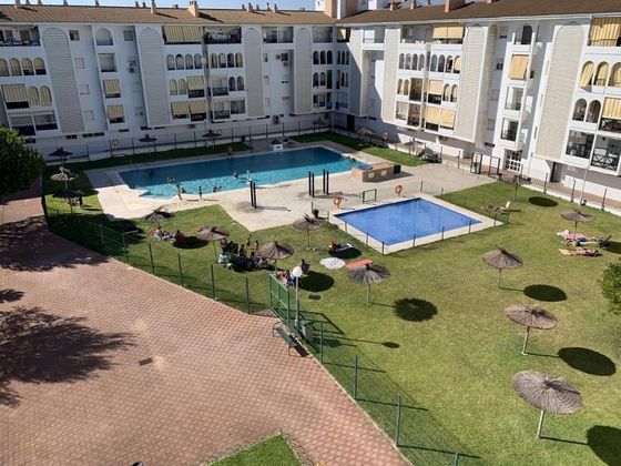 Foto 1 de Piso en venta en Punta Umbría de 2 habitaciones con terraza y piscina