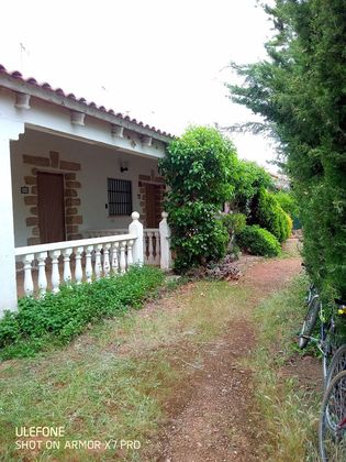 Foto 2 de Casa adossada en venda a calle Escudero Guadiana de 1 habitació amb terrassa i jardí