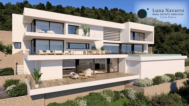 Foto 1 de Chalet en venta en urbanización Cumbre del Sol de 5 habitaciones con terraza y piscina