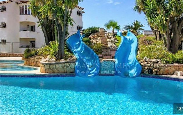 Foto 1 de Casa adossada en venda a Les Marines/Las Marinas de 3 habitacions amb terrassa i piscina
