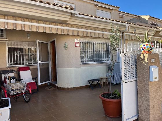 Foto 1 de Venta de casa adosada en calle Santa Rosalía de 4 habitaciones con terraza y jardín