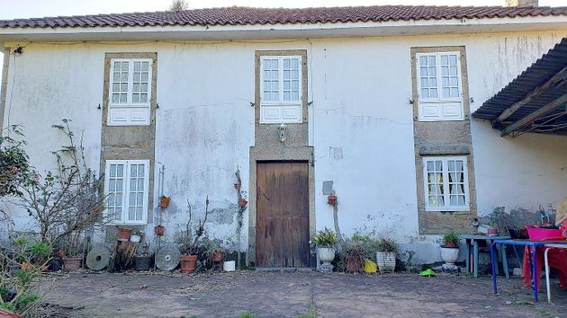 Foto 2 de Chalet en venta en Irixoa de 4 habitaciones con garaje y jardín
