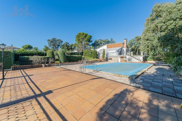 Foto 1 de Xalet en venda a Villa del Prado de 6 habitacions amb terrassa i piscina