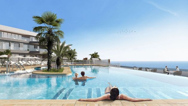 Foto 1 de Piso en venta en Águilas ciudad de 3 habitaciones con terraza y piscina