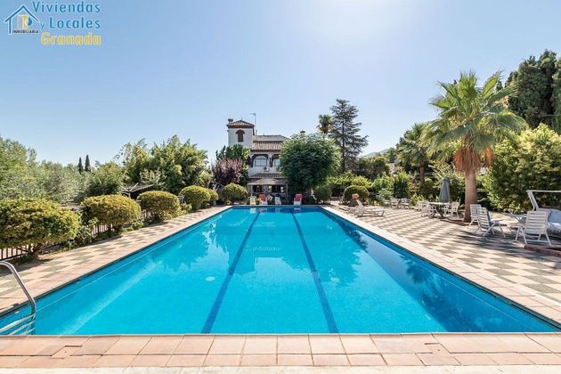 Foto 2 de Venta de chalet en Zubia (La) de 8 habitaciones con terraza y piscina
