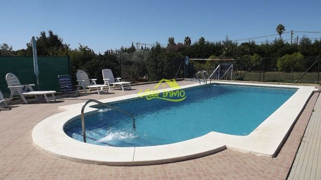 Foto 2 de Casa rural en venta en Punta Umbría de 5 habitaciones con terraza y piscina