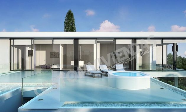Foto 2 de Xalet en venda a Joc de la Bola - Camps d'Esports - Ciutat Jardí - Montcada de 12 habitacions amb terrassa i piscina