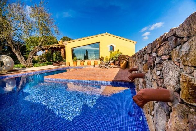 Foto 1 de Casa en venda a Mont-Ras de 5 habitacions amb piscina i garatge