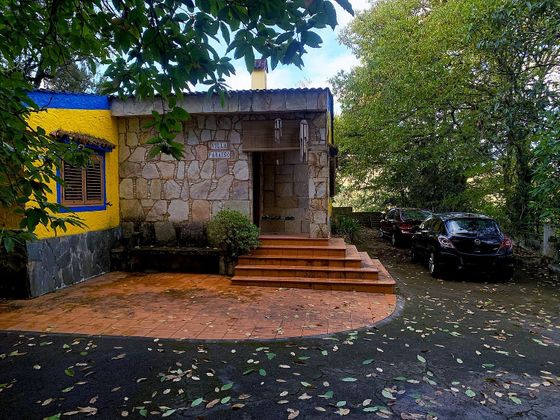 Foto 1 de Casa en venda a Moya de 4 habitacions amb terrassa i jardí