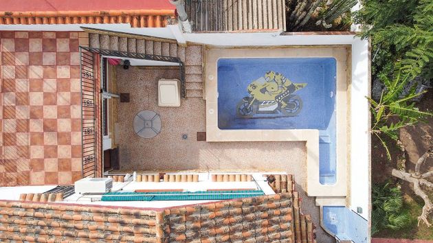 Foto 1 de Venta de casa en Moncada de 4 habitaciones con terraza y piscina