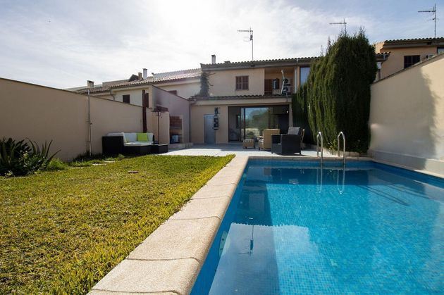 Foto 1 de Casa adossada en venda a Selva de 3 habitacions amb terrassa i piscina