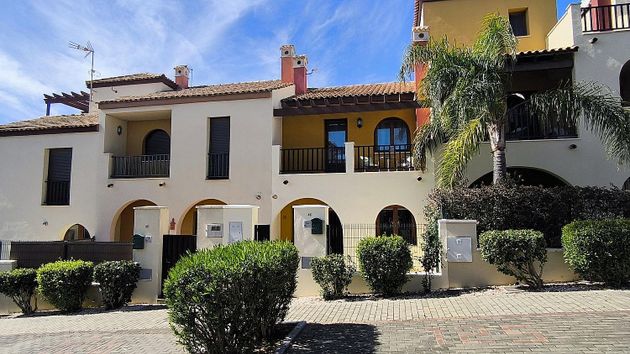 Foto 1 de Casa adossada en venda a Costa Esuri de 2 habitacions amb terrassa i piscina