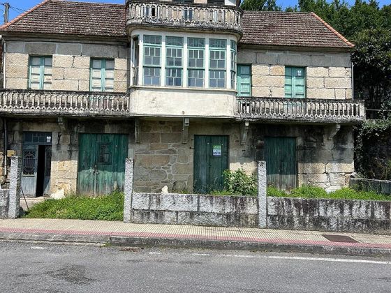 Foto 1 de Casa en venda a calle Fermín Bouza Brey de 3 habitacions amb garatge i jardí