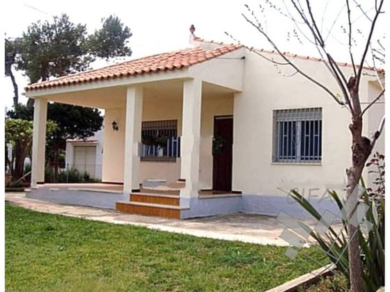 Foto 1 de Casa en venda a Cala del Puntal  de 5 habitacions amb terrassa i jardí