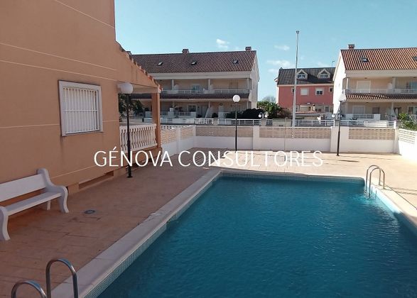 Foto 1 de Venta de casa adosada en El Perelló - Les Palmeres - Mareny de Barraquetes de 5 habitaciones con terraza y piscina