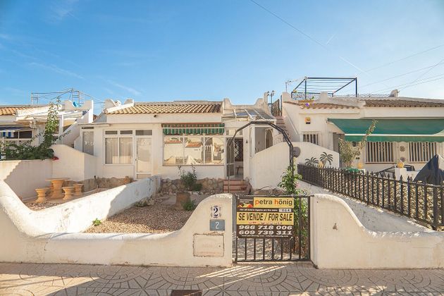 Foto 1 de Casa adossada en venda a urbanización Bungalows Rosas de 2 habitacions amb terrassa i piscina