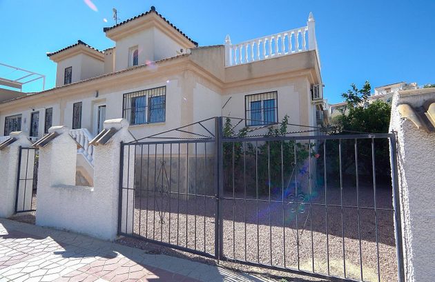 Foto 1 de Casa adossada en venda a calle Quesada Ballester de 2 habitacions amb terrassa i piscina