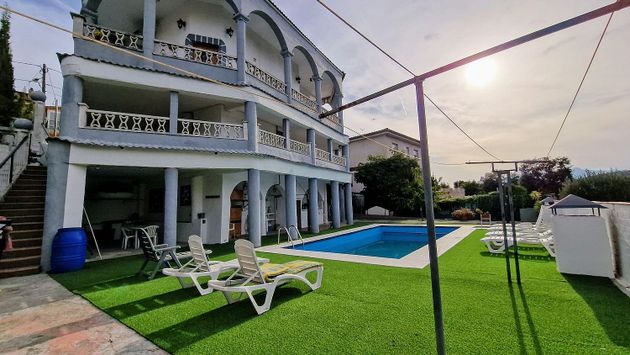 Foto 1 de Venta de chalet en Residencial Park de 6 habitaciones con terraza y piscina