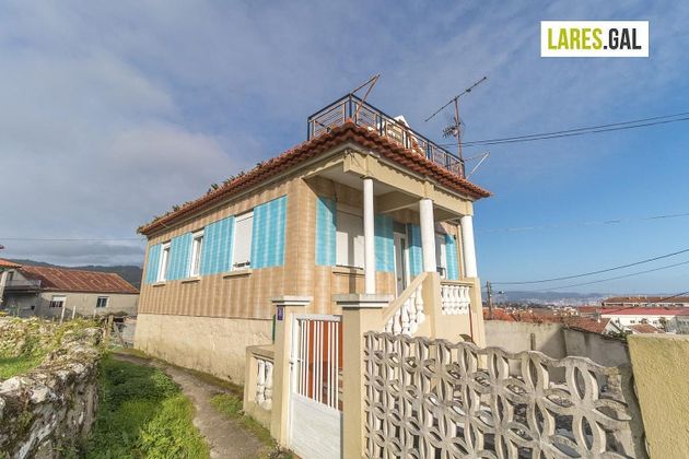 Foto 1 de Casa en venda a Cangas de 3 habitacions amb terrassa i balcó