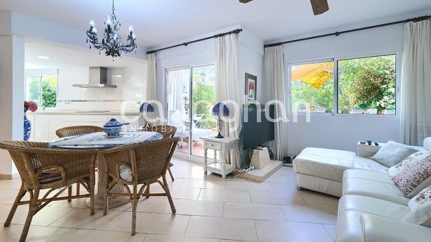 Foto 1 de Casa adosada en venta en Playa de Gandia de 3 habitaciones con terraza y garaje