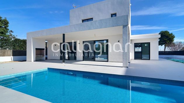Foto 1 de Xalet en venda a Carlet de 4 habitacions amb terrassa i piscina
