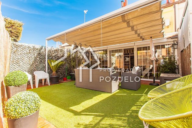 Foto 1 de Casa adossada en venda a El Soto de la Moraleja de 3 habitacions amb terrassa i piscina