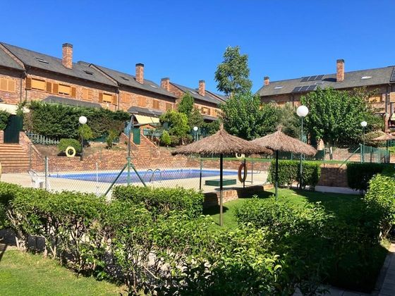 Foto 1 de Casa adosada en venta en Viñas Viejas de 5 habitaciones con terraza y piscina