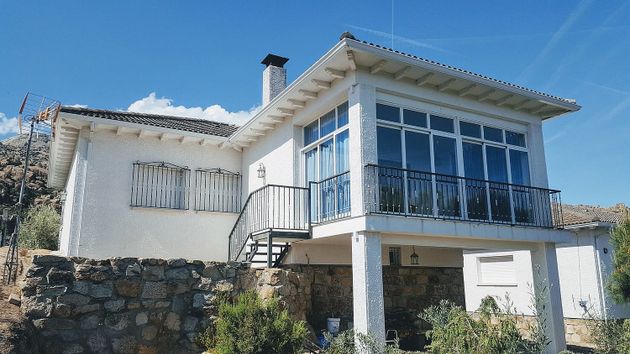 Foto 1 de Venta de chalet en Manzanares el Real de 4 habitaciones con terraza y garaje
