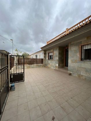 Foto 1 de Casa adosada en venta en calle Paraje Hermita la Mina de 4 habitaciones con terraza y piscina