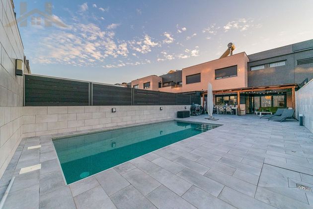 Foto 1 de Venta de casa adosada en calle De Ibiza de 4 habitaciones con terraza y piscina