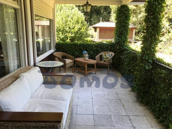 Foto 1 de Casa en venta en Outeiro de Rei de 6 habitaciones con garaje y jardín