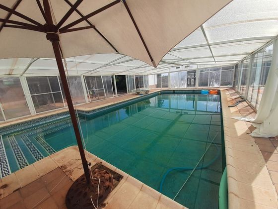 Foto 1 de Chalet en venta en Argamasilla de Calatrava de 3 habitaciones con piscina y jardín