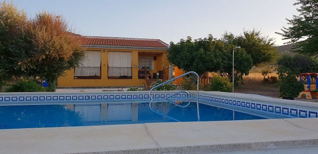 Foto 1 de Venta de casa rural en Brazatortas de 2 habitaciones con piscina y aire acondicionado