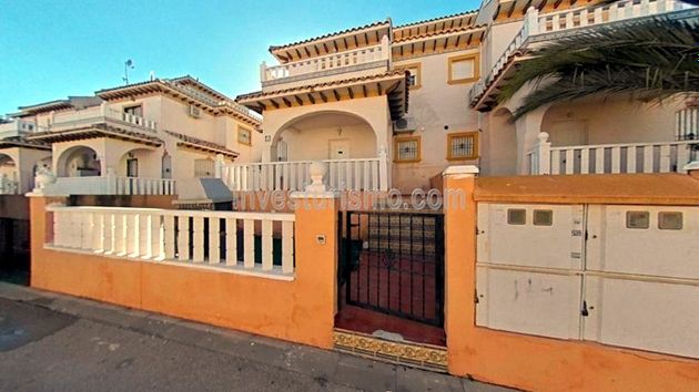 Foto 2 de Casa adosada en venta en calle Cabo de Palos de 3 habitaciones con terraza y piscina