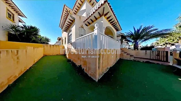 Foto 1 de Casa adosada en venta en calle Cabo de Palos de 3 habitaciones con terraza y piscina