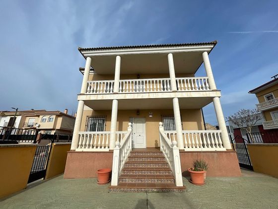 Foto 1 de Casa en venda a Cúllar Vega de 9 habitacions amb terrassa