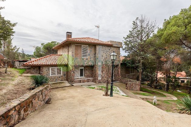 Foto 1 de Chalet en venta en Sevilla la Nueva de 5 habitaciones con terraza y piscina