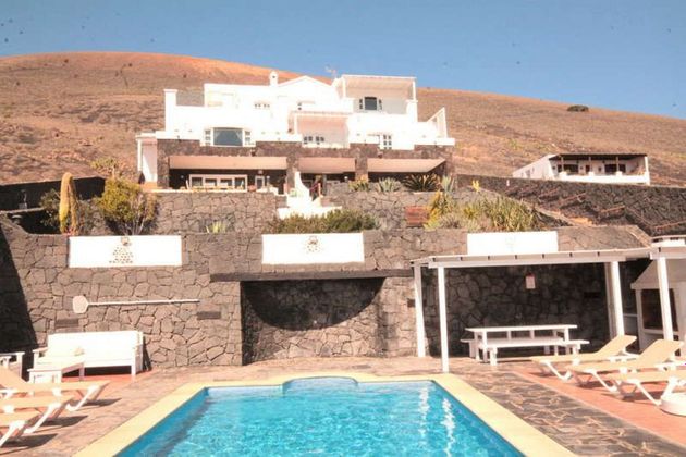 Foto 1 de Venta de casa en La Asomada de 9 habitaciones con terraza y piscina