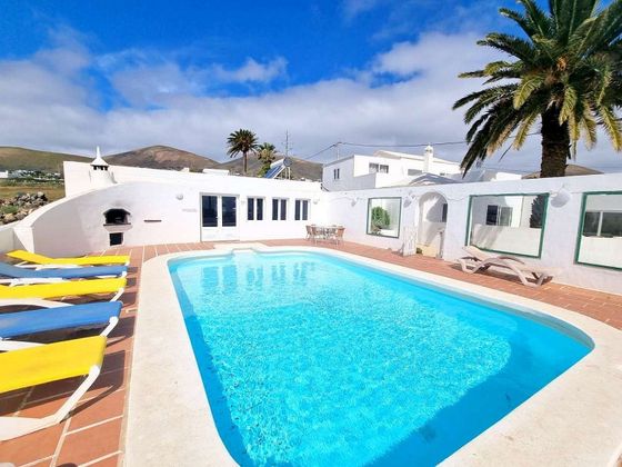 Foto 1 de Xalet en venda a La Asomada de 11 habitacions amb terrassa i piscina