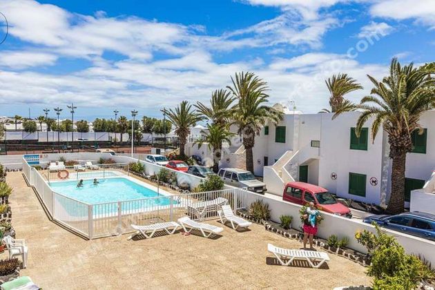 Foto 1 de Pis en venda a Puerto del Carmen de 1 habitació amb terrassa i piscina
